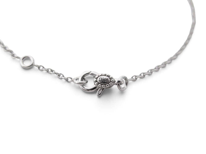 Dior Rose des Vents - Bracelet 3 motifs en or blanc, diamants et nacre 58 Facettes 276468