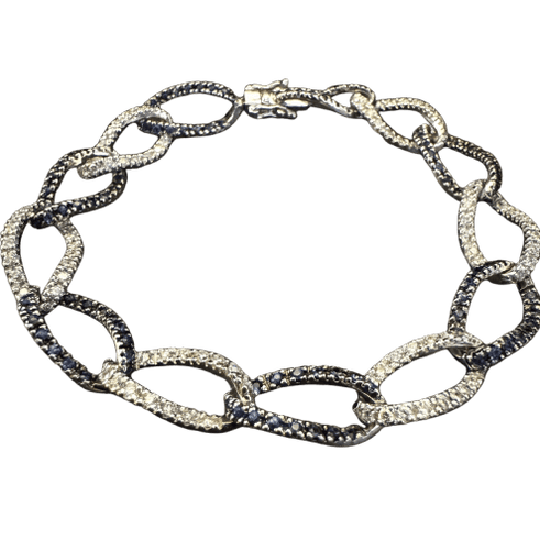 Bracelet années 80 en or blanc, diamants et saphirs 58 Facettes 4525AA