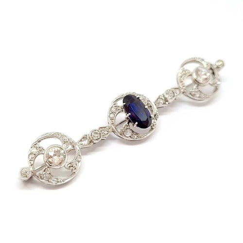 Broche Broche Art déco (1920-1935) en or blanc 18 carats et platine, saphir et diamants 58 Facettes BVP-BRO-0111