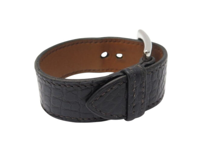 Hermès - Bracelet manchette Boucle Étrivière en cuir de crocodile alligator 58 Facettes 260320