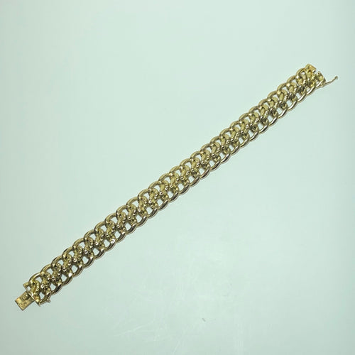 Montre Bracelet maille américaine en or jaune 18 carats 58 Facettes 250395