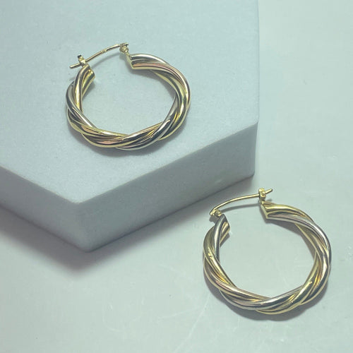 Boucles d'oreilles Boucles d'oreilles créoles torsadées en or 18 carats 58 Facettes 250218