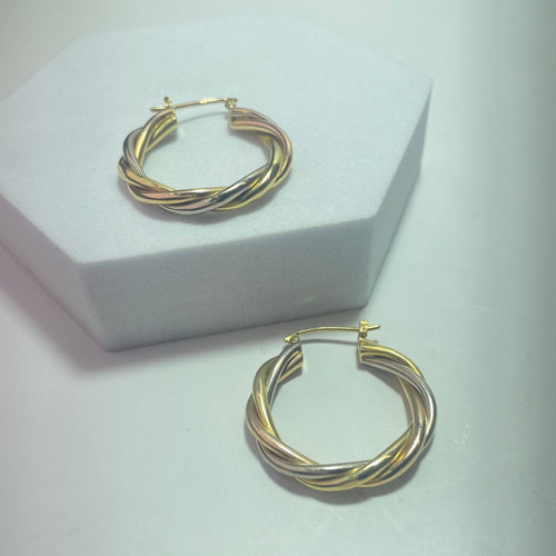 Boucles d'oreilles Boucles d'oreilles créoles torsadées en or 18 carats 58 Facettes 250218