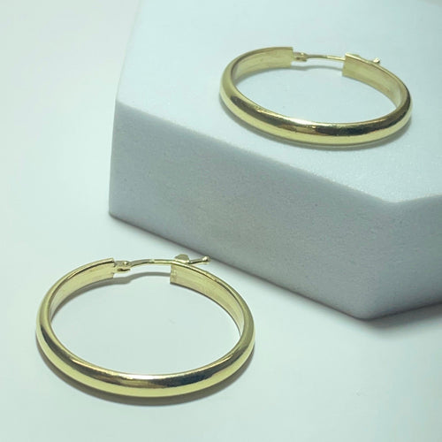 Boucles d'oreilles Boucles d'oreilles créoles en or jaune 18K 58 Facettes 250317