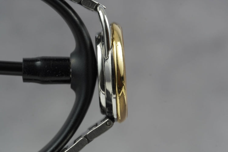 Hermès Arceau - Montre en or jaune et acier 58 Facettes TOT-11230
