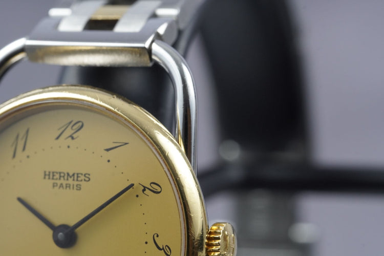 Hermès Arceau - Montre en or jaune et acier 58 Facettes TOT-11230