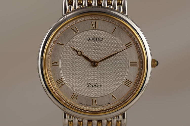 Seiko Dolce - Montre homme en acier bicolore 58 Facettes TOT-11016