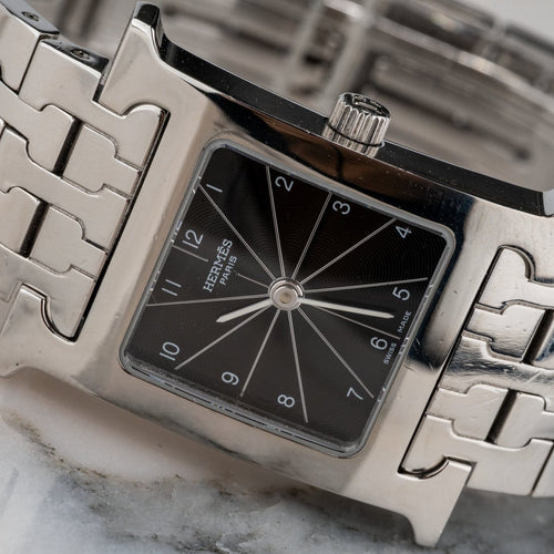 Montre Hermès Heure H - Montre quartz en acier 58 Facettes TOT-02118