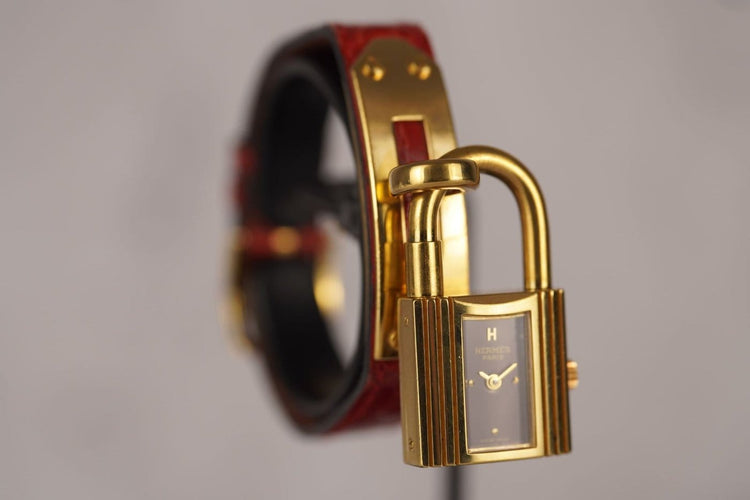 Montre Hermès Kelly - Montre plaqué or cadran bordeaux 58 Facettes TOT-11128