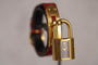 Hermès Kelly - Montre plaqué or sur cuir bordeaux 58 Facettes TOT-11128