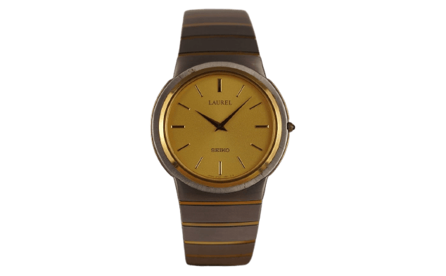Montre Seiko Laurel - Montre unisexe acier et lunette or jaune 58 Facettes TOT-10679