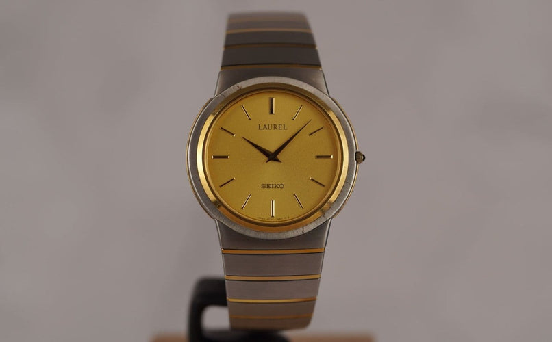 Montre Seiko Laurel - Montre unisexe acier et lunette or jaune 58 Facettes TOT-10679