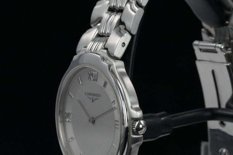 Longines Quartz - Montre unisexe en acier 58 Facettes TOT-01874