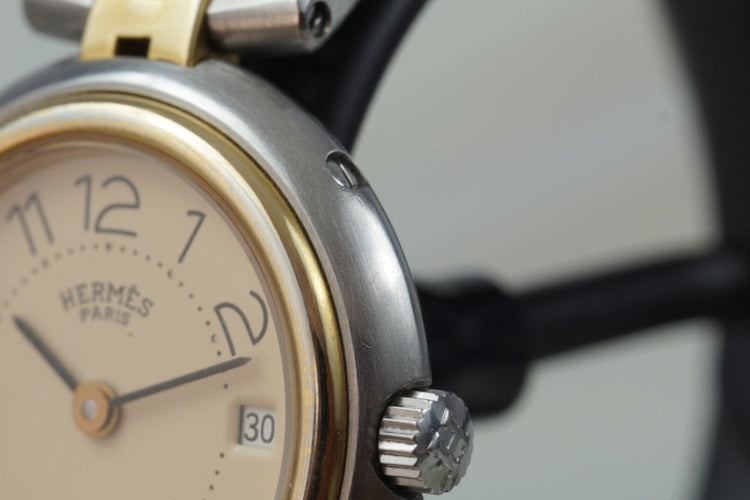 Hermès Profile - Montre quartz en acier bicolore 58 Facettes TOT-11211