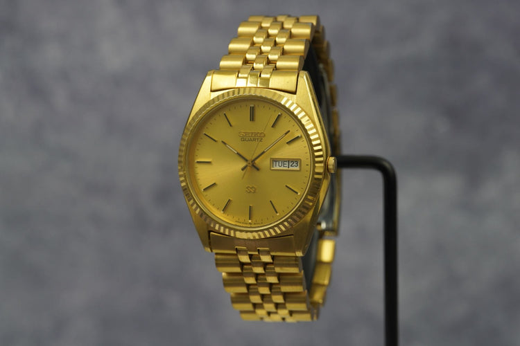 Seiko Quartz SQ - Montre Day Date en acier 58 Facettes TOT-11182