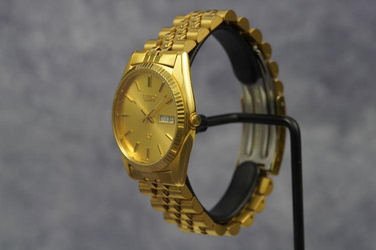 Seiko Quartz SQ - Montre Day Date en acier 58 Facettes TOT-11182