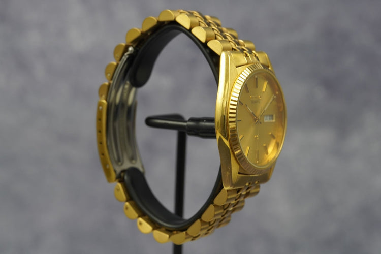 Seiko Quartz SQ - Montre Day Date en acier 58 Facettes TOT-11182