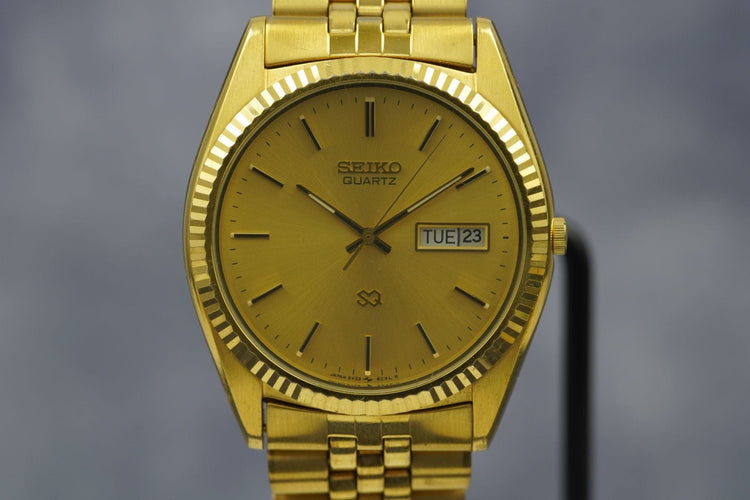 Seiko Quartz SQ - Montre Day Date en acier 58 Facettes TOT-11182