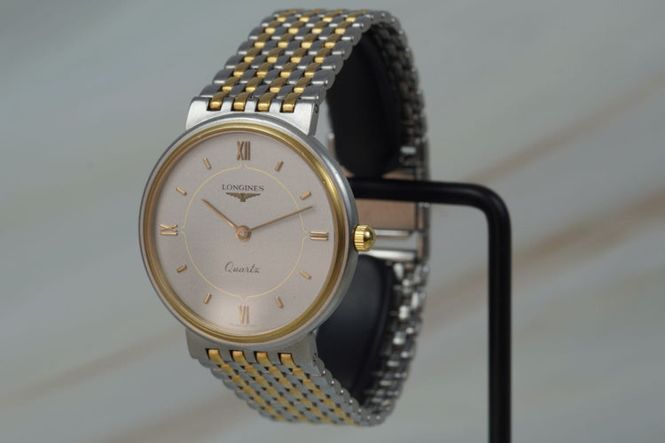 Longines Quartz - Montre unisexe en acier bicolore 58 Facettes TOT-11210