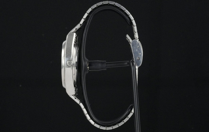 Seiko King Quartz - Montre en acier 58 Facettes TOT-01875