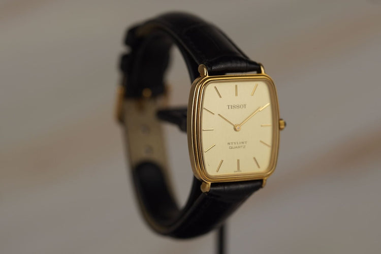 Montre Tissot Stylist - Montre tonneau plaqué or 58 Facettes TOT-11041