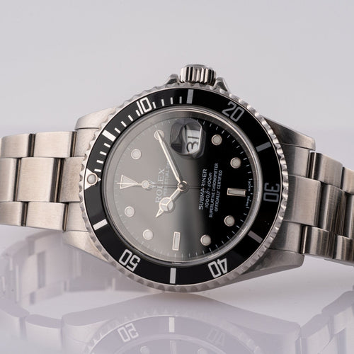 Rolex Submariner Date 16610T - Montre en acier 58 Facettes TOT-02011