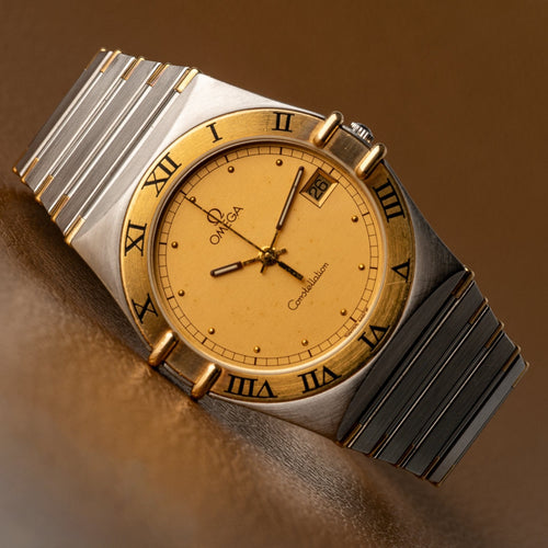 Omega Constellation - Montre quartz en or et acier 58 Facettes TOT-02214