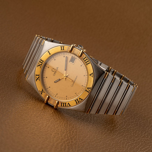 Omega Constellation - Montre quartz en or et acier 58 Facettes TOT-02214
