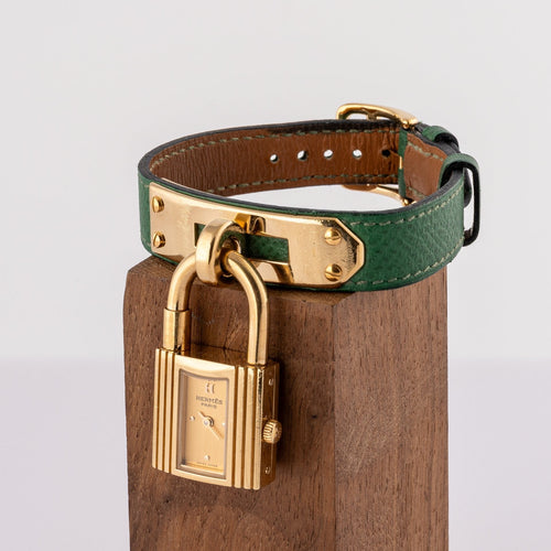 Hermès Kelly - Montre plaqué or cuir vert 58 Facettes TOT-02370