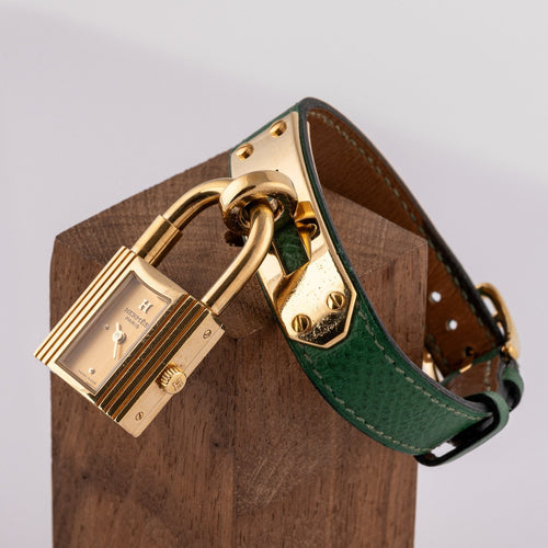 Hermès Kelly - Montre plaqué or cuir vert 58 Facettes TOT-02370