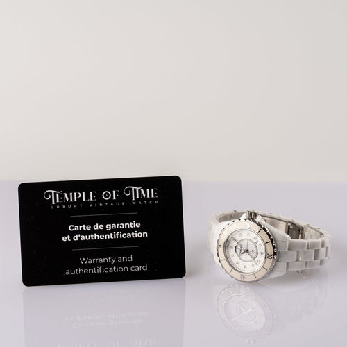 Chanel J12 - Montre en céramique blanche et diamants 58 Facettes TOT-02272