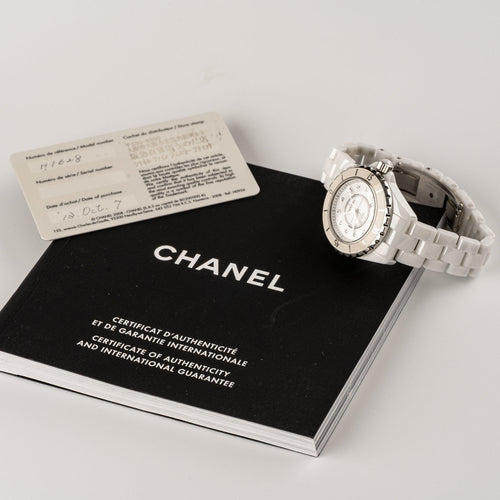 Chanel J12 - Montre en céramique blanche et diamants 58 Facettes TOT-02272