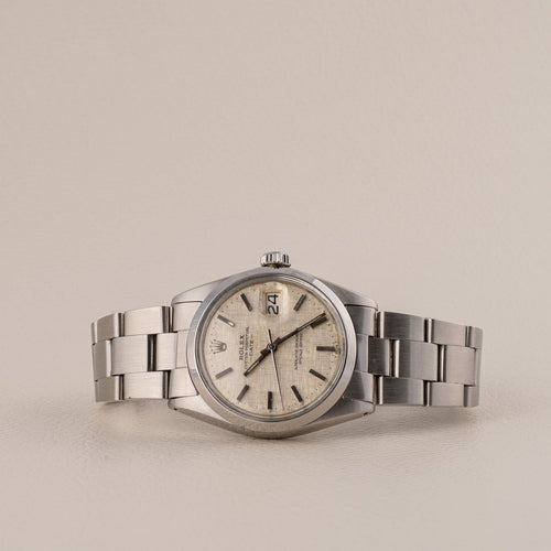 Rolex Oyster Perpetual Date - Montre en acier 58 Facettes TOT-02302