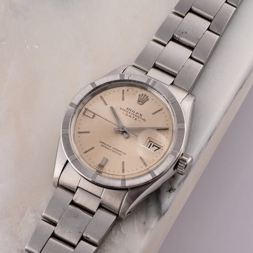 Rolex Oyster Perpetual Date - Montre en acier 58 Facettes TOT-02285