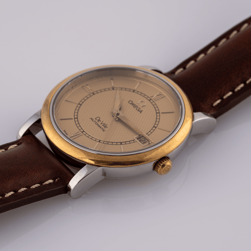 Omega De Ville Automatic Prestige - Montre en or et acier 58 Facettes TOT-02431