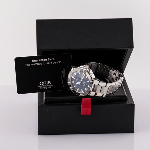 Oris Aquis - Montre de plongée en acier cadran bleu 58 Facettes TOT-02425