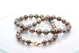 Collier Collier de perles de culture de Tahiti avec fermoir en or 18k 58 Facettes 27722