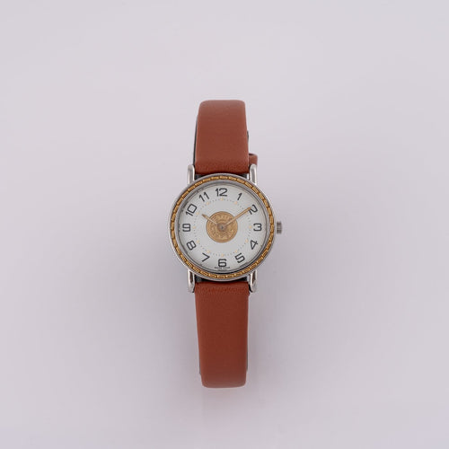 Montre Hermès Sellier 83.03 - Montre homme en acier et or jaune 58 Facettes TOT-02406
