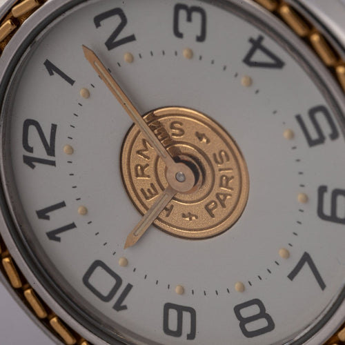 Montre Hermès Sellier 83.03 - Montre homme en acier et or jaune 58 Facettes TOT-02406