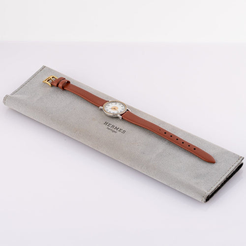 Montre Hermès Sellier 83.03 - Montre homme en acier et or jaune 58 Facettes TOT-02406