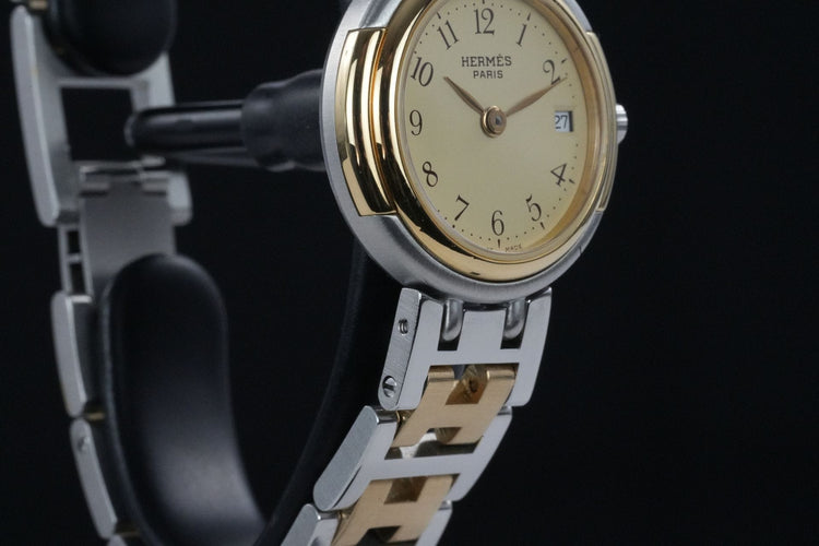 Hermès Windsor - Montre en acier et plaqué or 58 Facettes TOT-01927