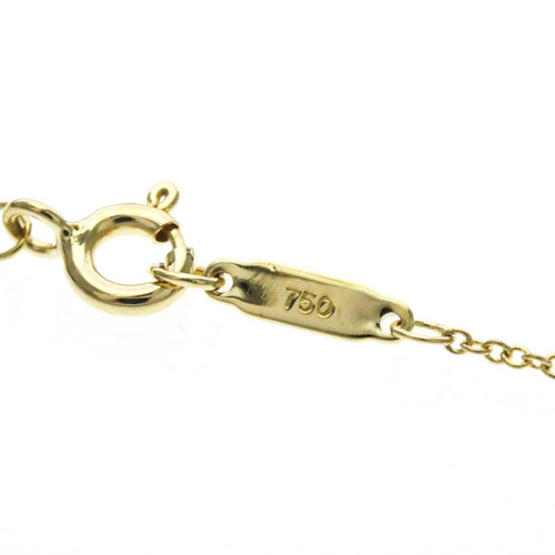 Tiffany & Co. - Pendentif croix en or jaune 18K et diamant 58 Facettes d5ynktsadv
