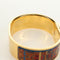 Hermès Loquet - Bracelet jonc en métal et émail imprimé 58 Facettes q8b78hsd8k