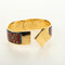Hermès Loquet - Bracelet jonc en métal et émail imprimé 58 Facettes q8b78hsd8k