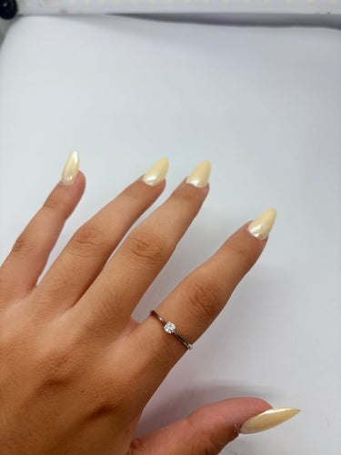 56 Bague solitaire en or blanc 18K et diamant 58 Facettes 2207