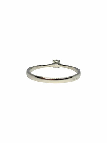 56 Bague solitaire en or blanc 18K et diamant 58 Facettes 2207
