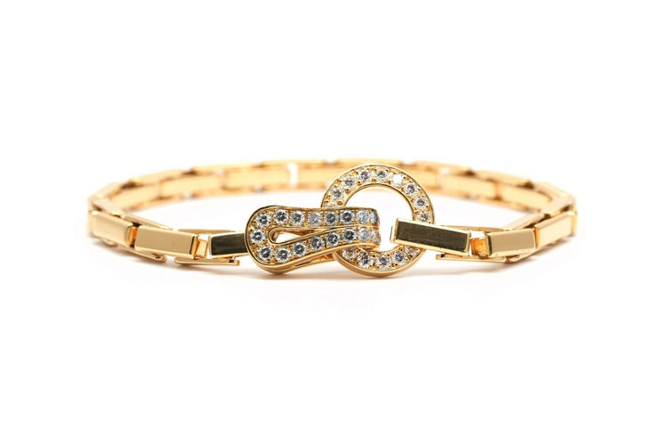 Bracelet Cartier Agrafe - Bracelet en or jaune et diamants 58 Facettes 23956