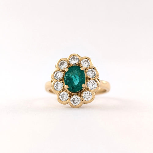 50 Bague marguerite en or jaune, émeraude et diamants 58 Facettes 37626