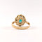 50 Bague marguerite en or jaune, émeraude et diamants 58 Facettes 37626