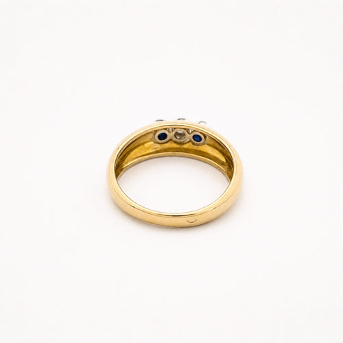 50 Bague trilogie en or jaune, or blanc, diamant et saphirs 58 Facettes 37718